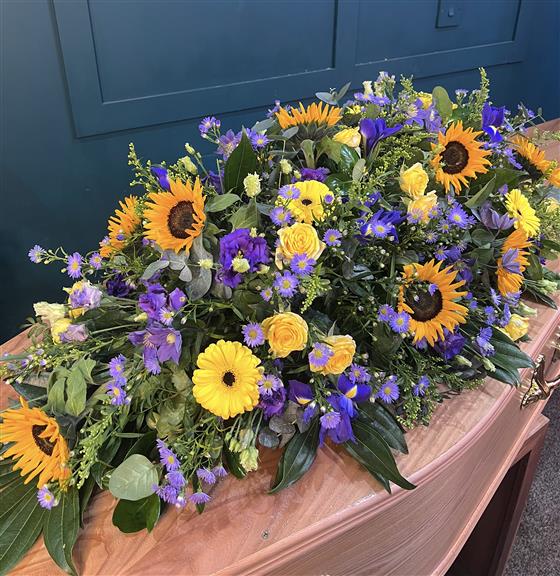 Sunflower & Purple Casket Spray