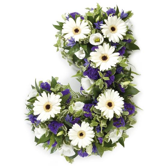 blue and white flowers on a funera letter