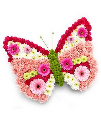 Butterfly-shaped floral arrangement with pink, white, and green flowers on a white background