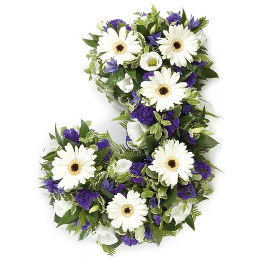blue and white flowers on a funera letter