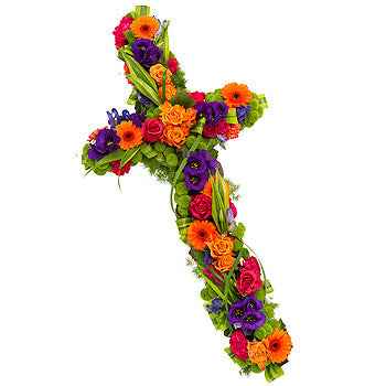Decorative cross made of flowers on a white background