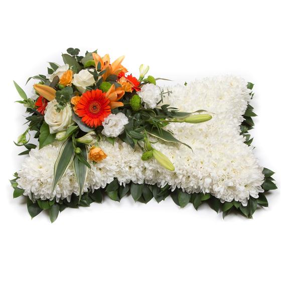 Floral arrangement with white and orange flowers on a white background